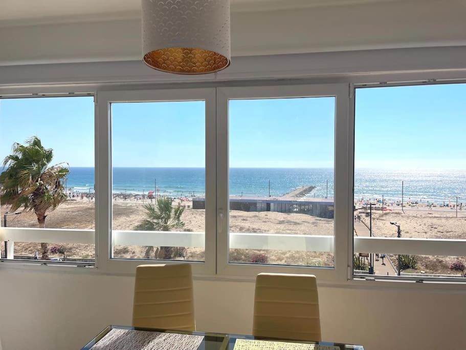 The View Costa Caparica Apartment Costa da Caparica Bagian luar foto